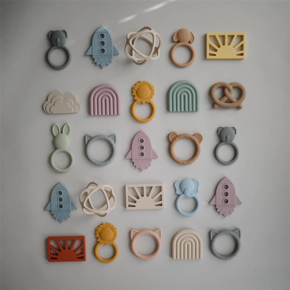 Mushie Beißring Sonne, Muted Yellow, aus Silikon, BPA-frei