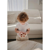 Mushie Sensorik-Spielzeug Blume, Rose, aus Silikon, BPA-frei