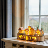 Bloomingville Norwich Deko mit Licht Natur Holz LED Weihnachtsdorf