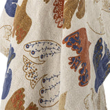 Bloomingville Anniversary Decke 160x130 cm – Nachhaltige Baumwolle mit grafischem Druck & Quasten