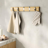 Umbra Flip Wandgarderobe, Garderobenleiste in Natur, mit 5 beweglichen Haken in Silber