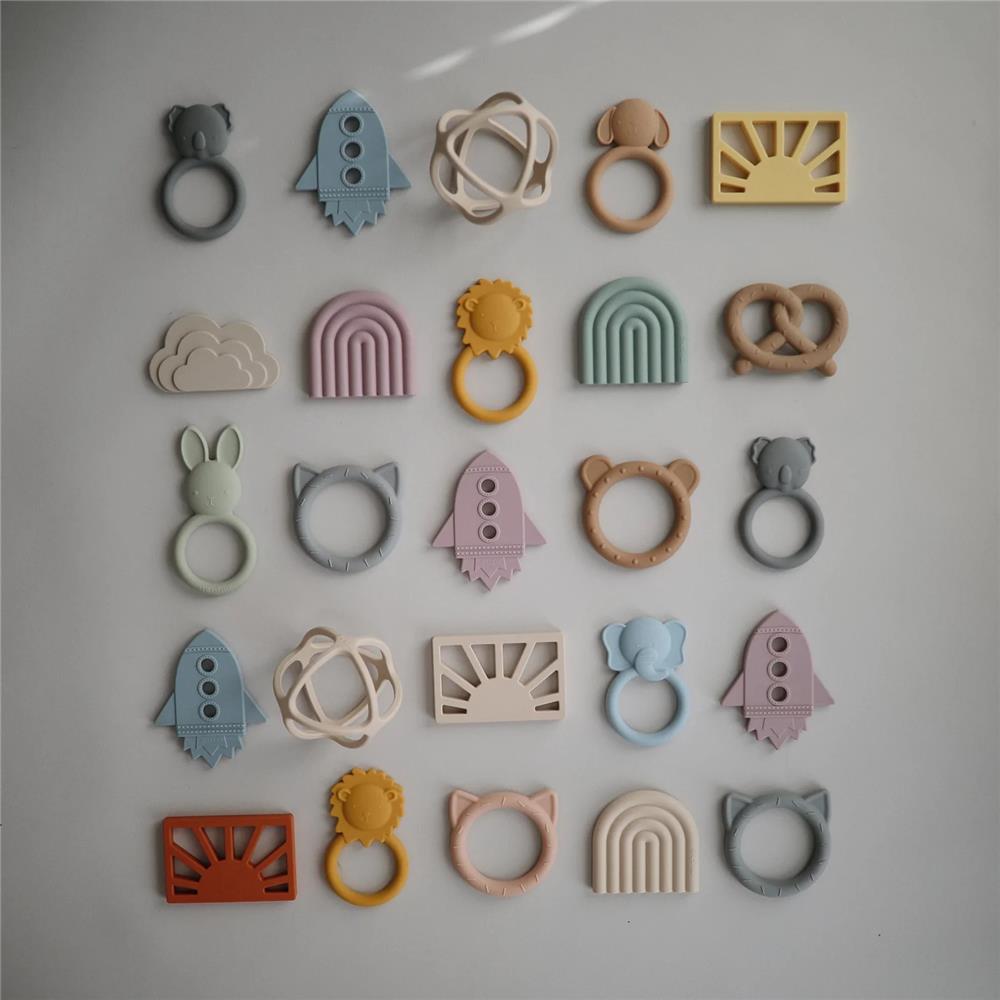 Mushie Beißring Sonne, Shifting Sand, aus Silikon, BPA-frei