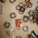 Mushie Beißring Sonne, Shifting Sand, aus Silikon, BPA-frei
