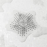 Umbra Starfish Abfluss Haarfänger mit Saugnäpfen, Silikon Abflusssieb, in Weiß