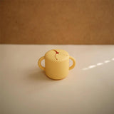 Mushie Snackbecher, Daffodil, aus Silikon, BPA-frei
